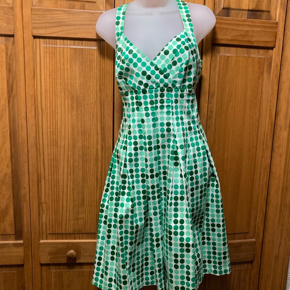 Green Calvin Klein polka dot cocktail dress.